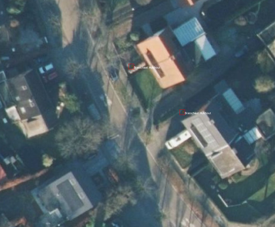 Aerial imagery of suburban landscape, the road is visible, two bus stops, both on the same side of the road, despite it would have been expected to have one on each side